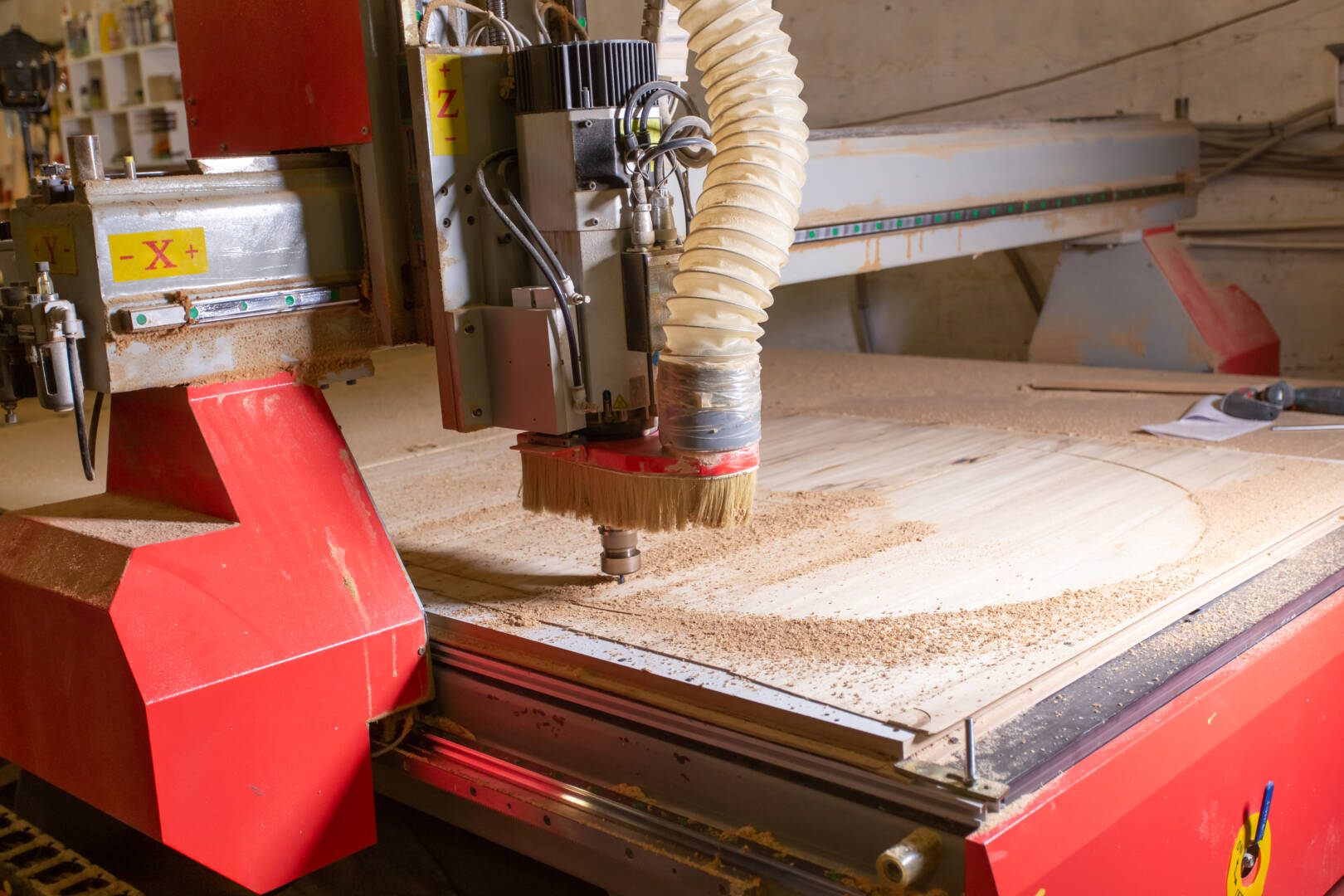 furniture factory, Small-Sized Companies, business concept - Pile of wood on electric brush.